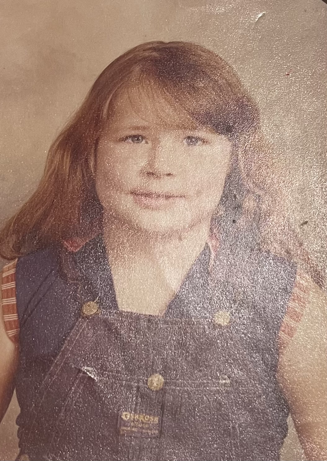 Picture of author when they were five years old